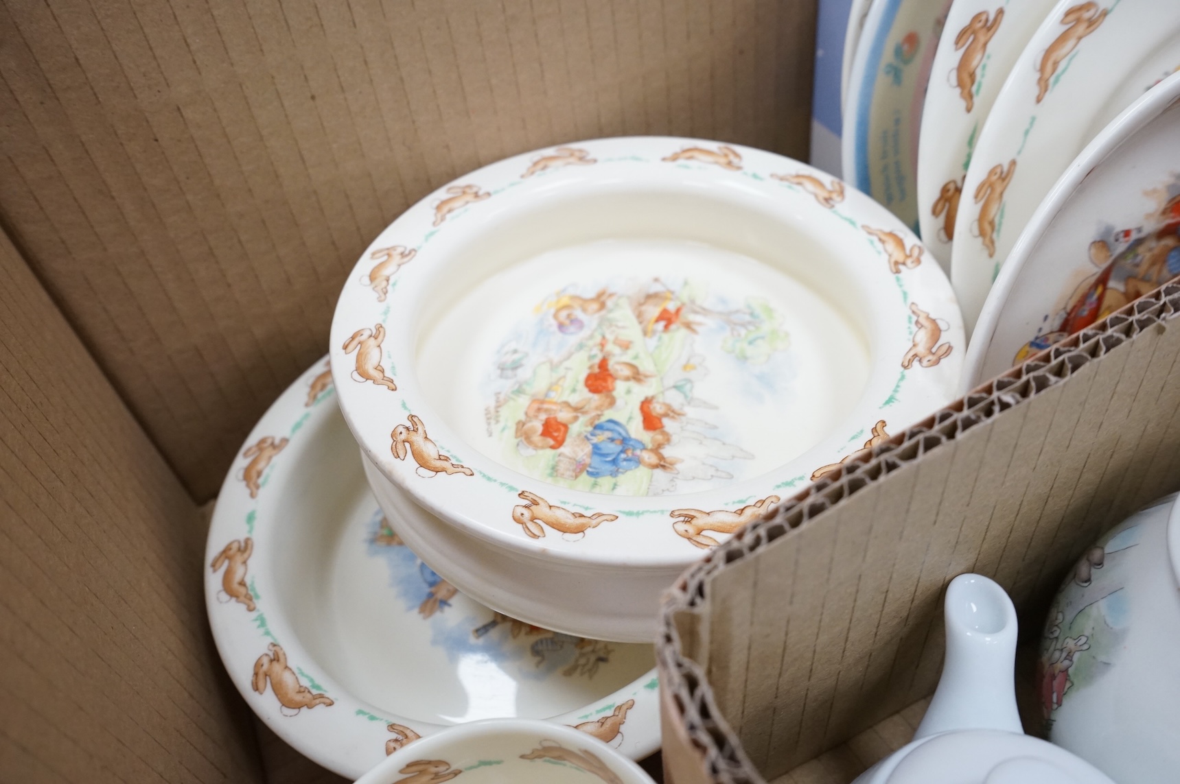 A collection of ‘Bunnykins’ dolls teaware and similar child’s breakfast ware, bowls 15cm diameter